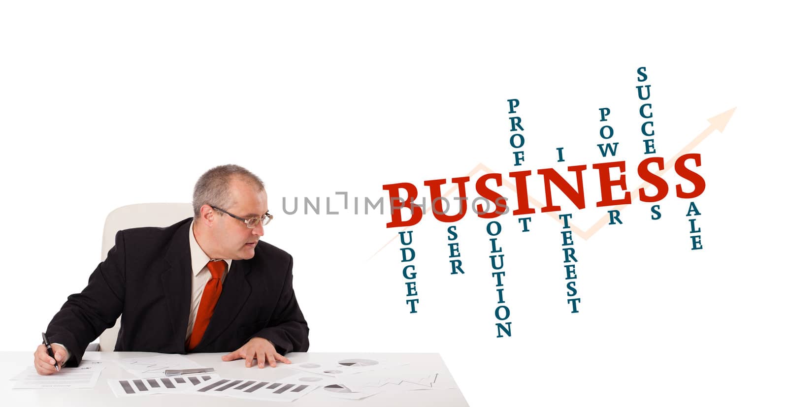 businessman sitting at desk with word cloud by ra2studio