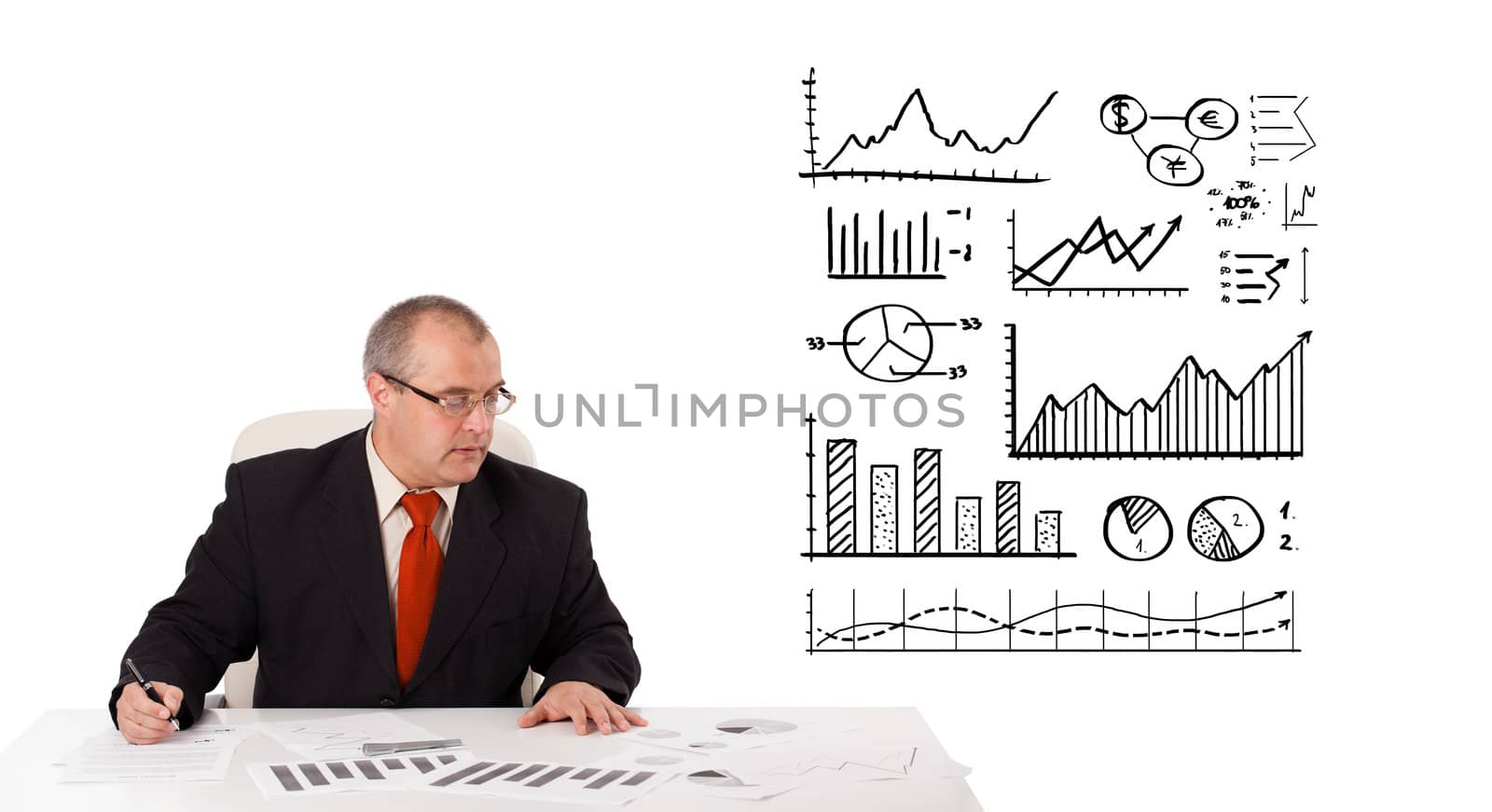 businessman sitting at desk with statistics and graphs, isolated on white