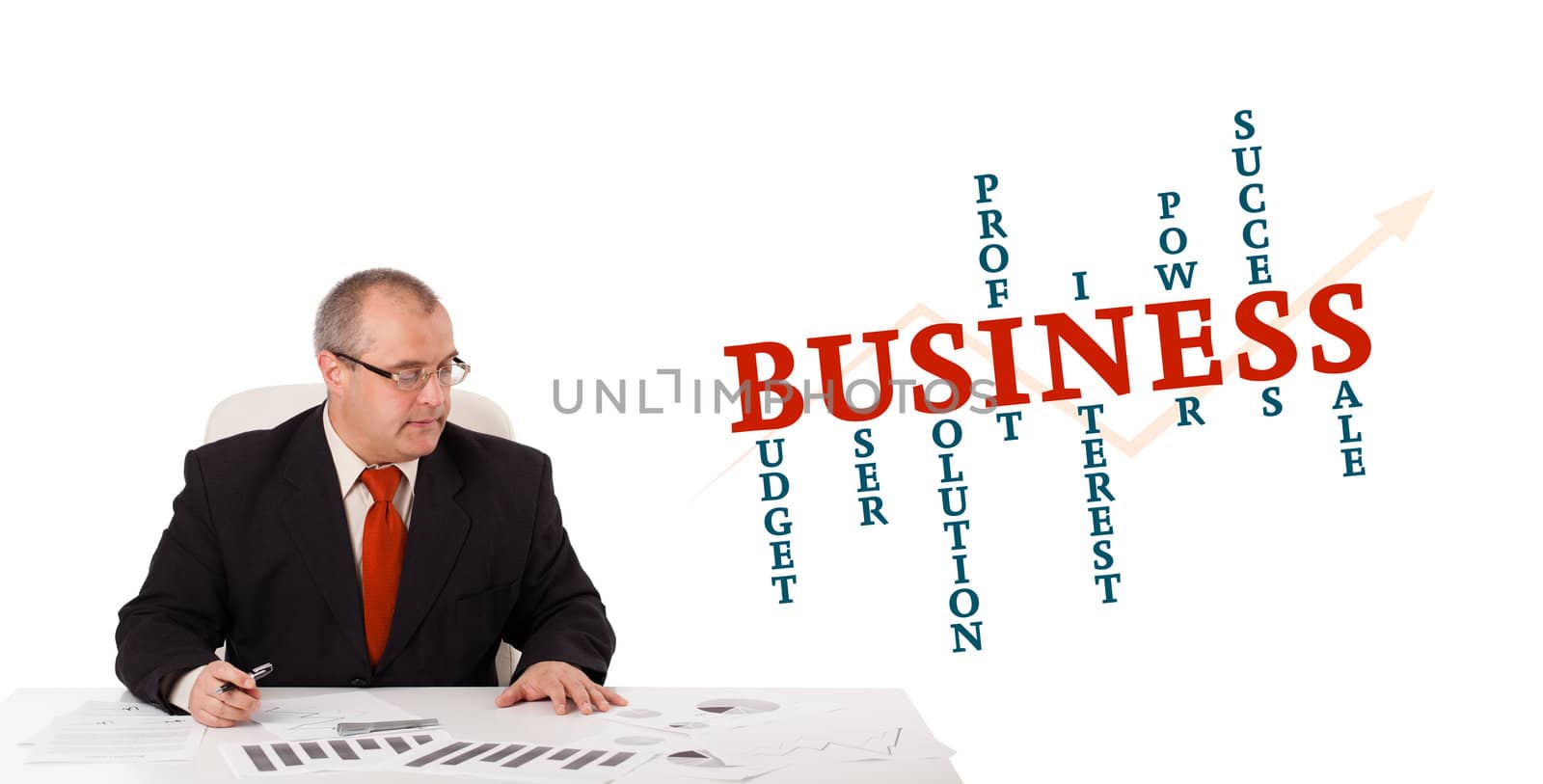 businessman sitting at desk with word cloud by ra2studio