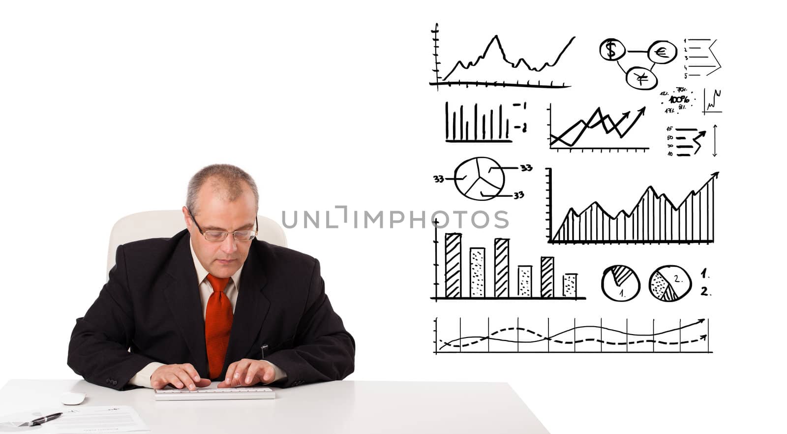 businessman sitting at desk with statistics and graphs, isolated on white