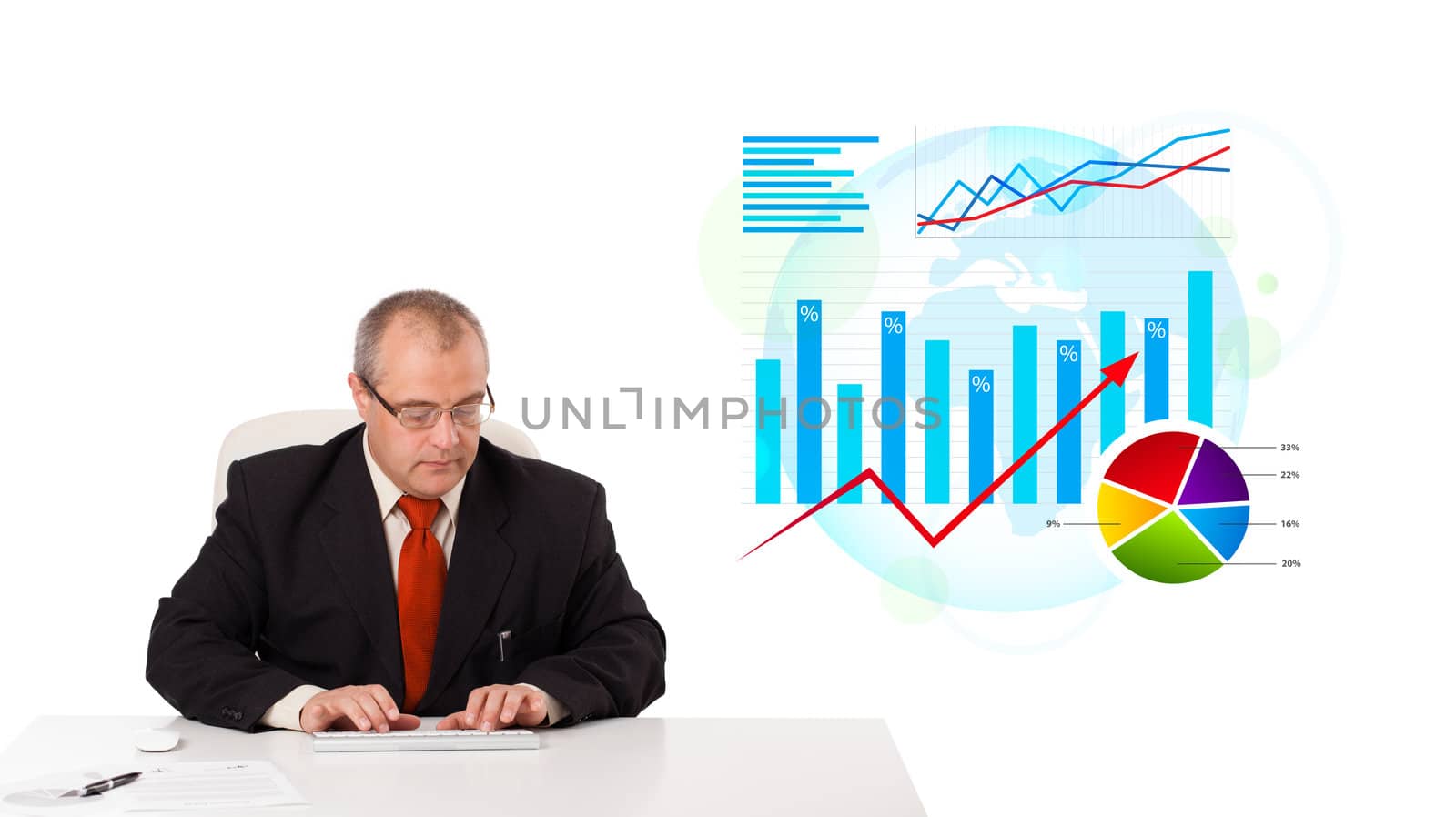 Businessman sitting at desk with statistics, isolated on white