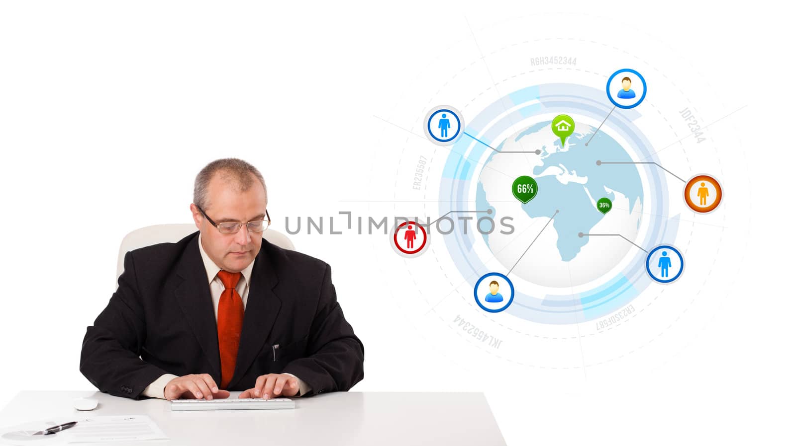 businessman sitting at desk and typing on keyboard with globe and social icons, isolated on white