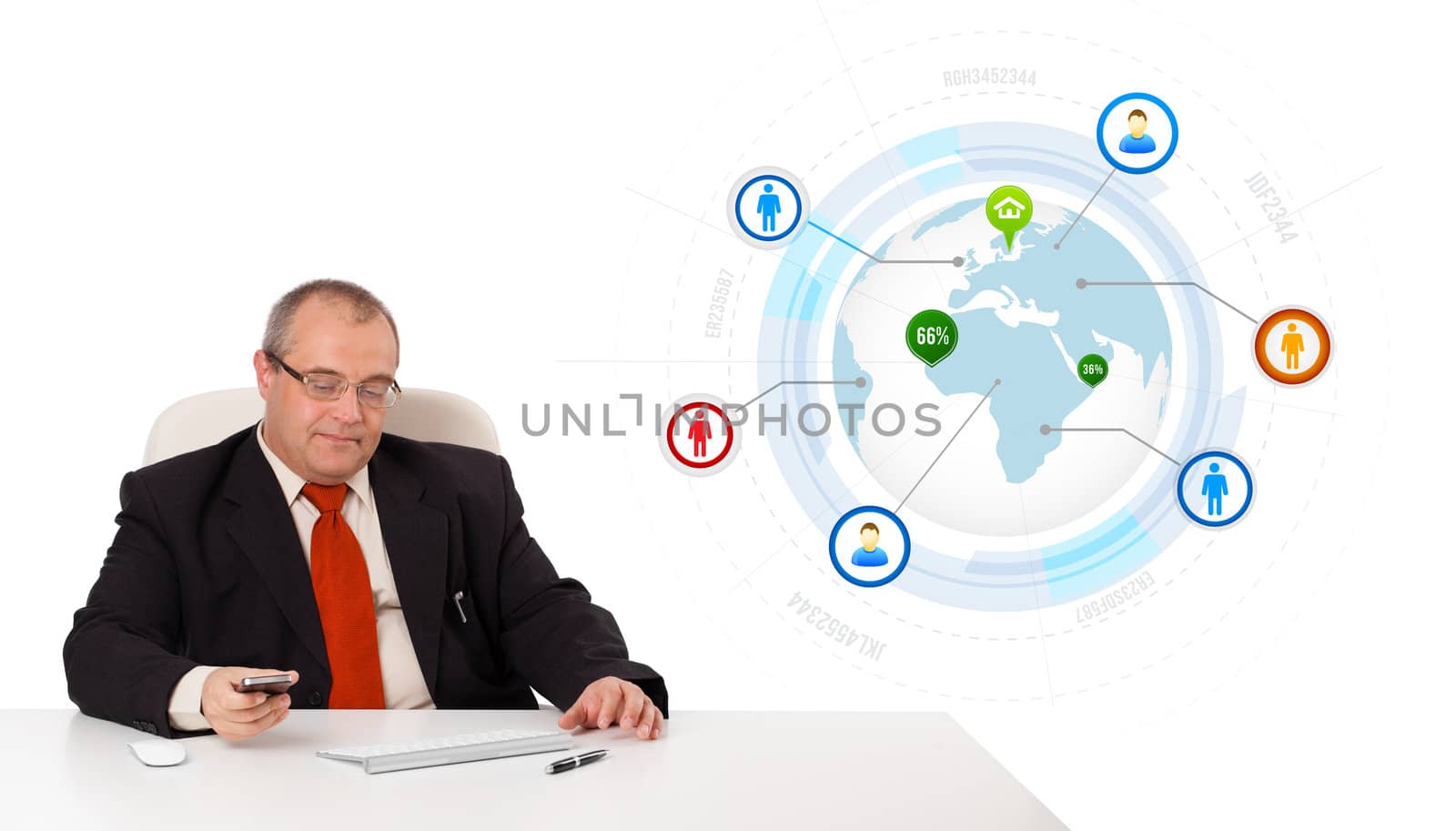 businessman sitting at desk and holding a mobilephone with globe and social icons, isolated on white