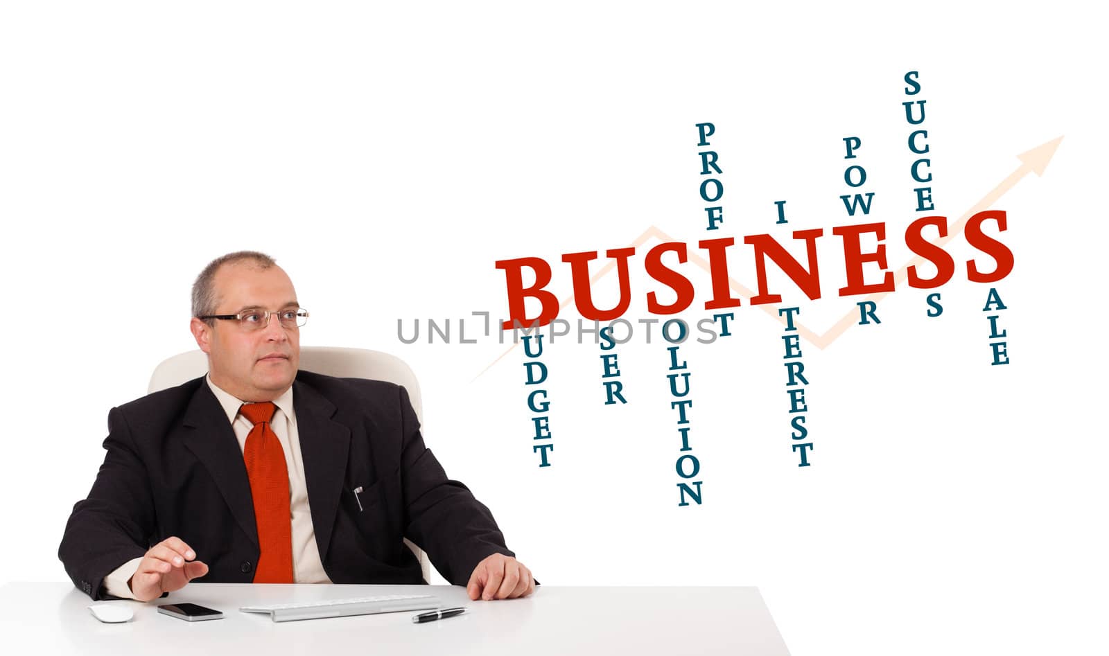 businesman sitting at desk with business word cloud, isolated on white