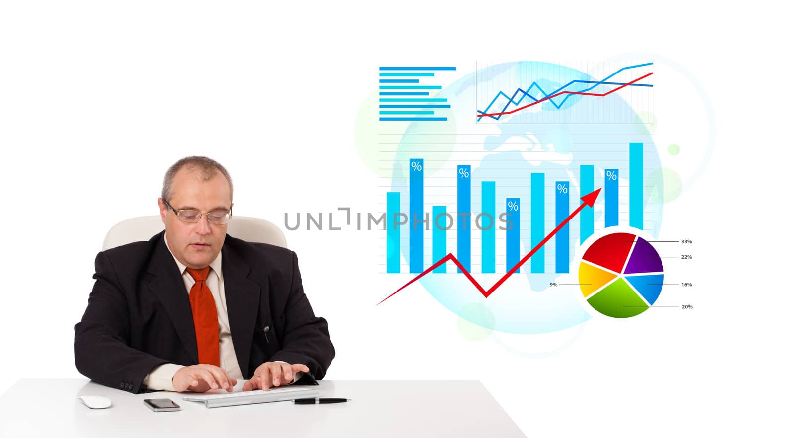 Businessman sitting at desk with statistics, isolated on white