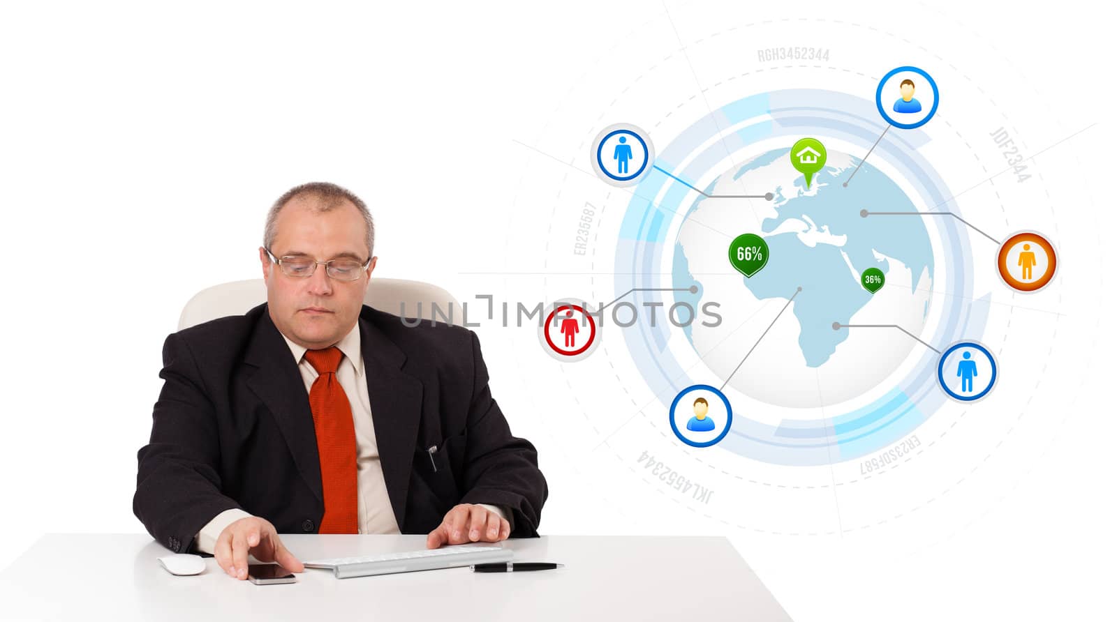 businessman sitting at desk and holding a mobilephone with globe and social icons, isolated on white