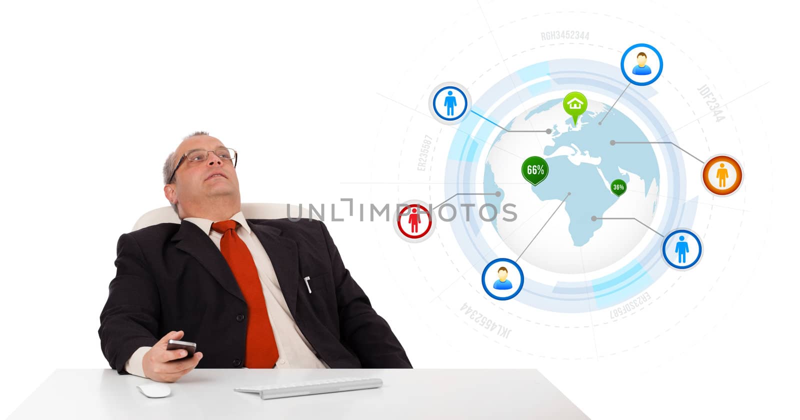 businessman sitting at desk and holding a mobilephone with globe and social icons, isolated on white