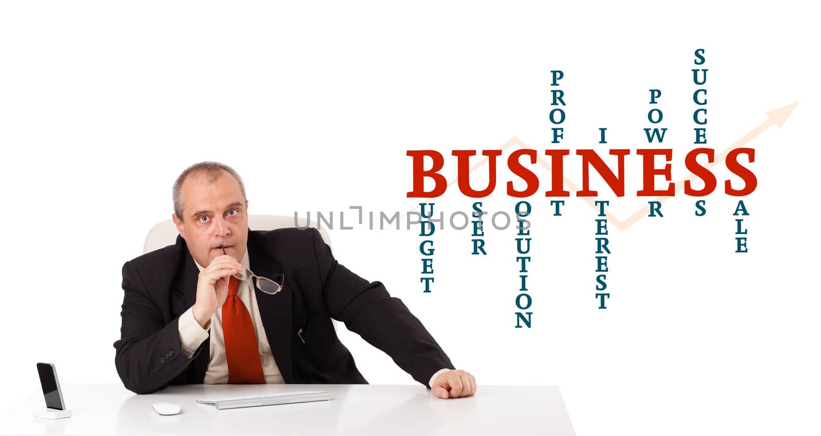 businesman sitting at desk with business word cloud, isolated on white