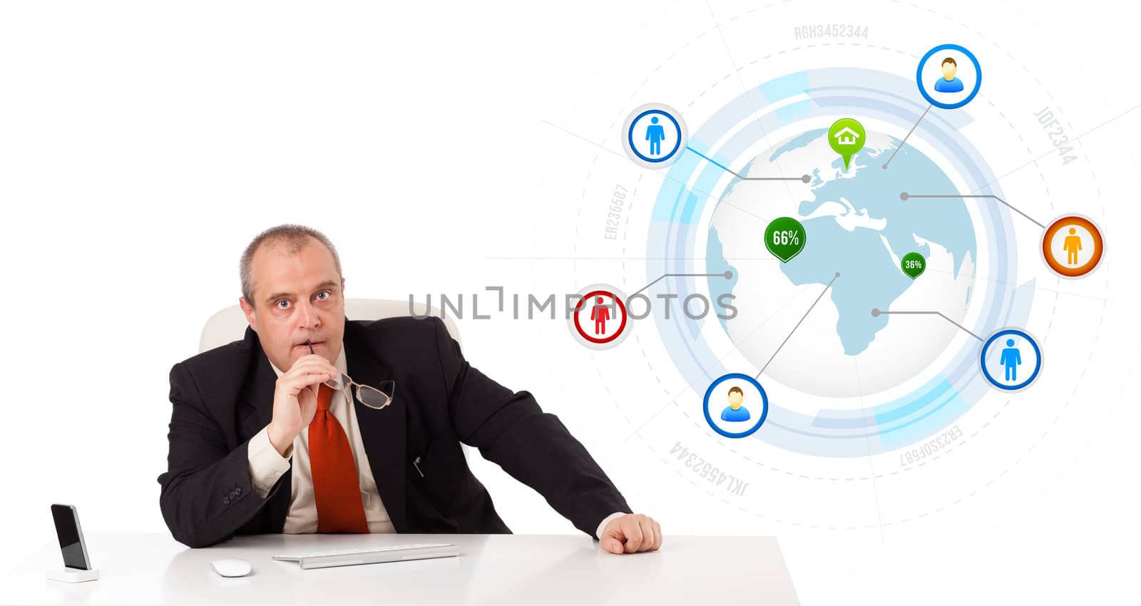 businessman sitting at desk with a globe and social icons, isolated on white