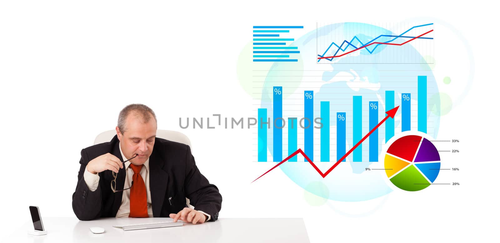 Businessman sitting at desk with statistics, isolated on white