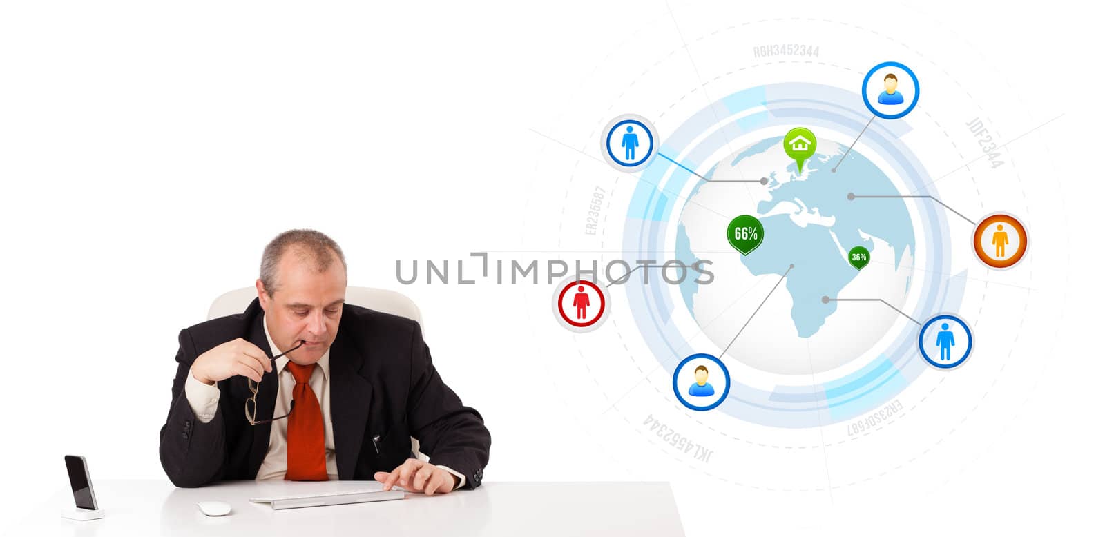 businessman sitting at desk and typing on keyboard with globe and social icons, isolated on white