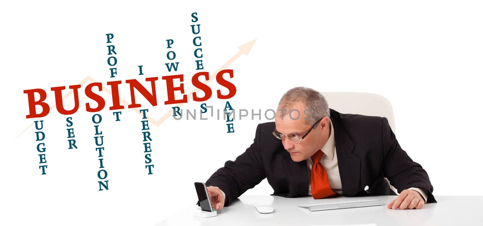 businesman sitting at desk with business word cloud by ra2studio