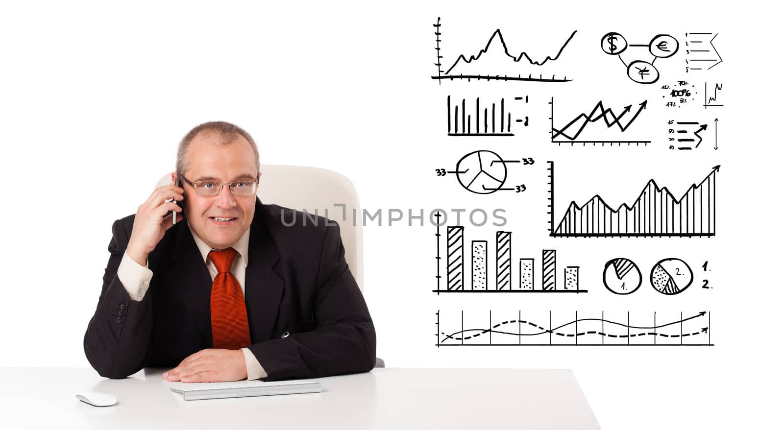 Businessman sitting at desk with diagrams and making a phone call, isolated on white