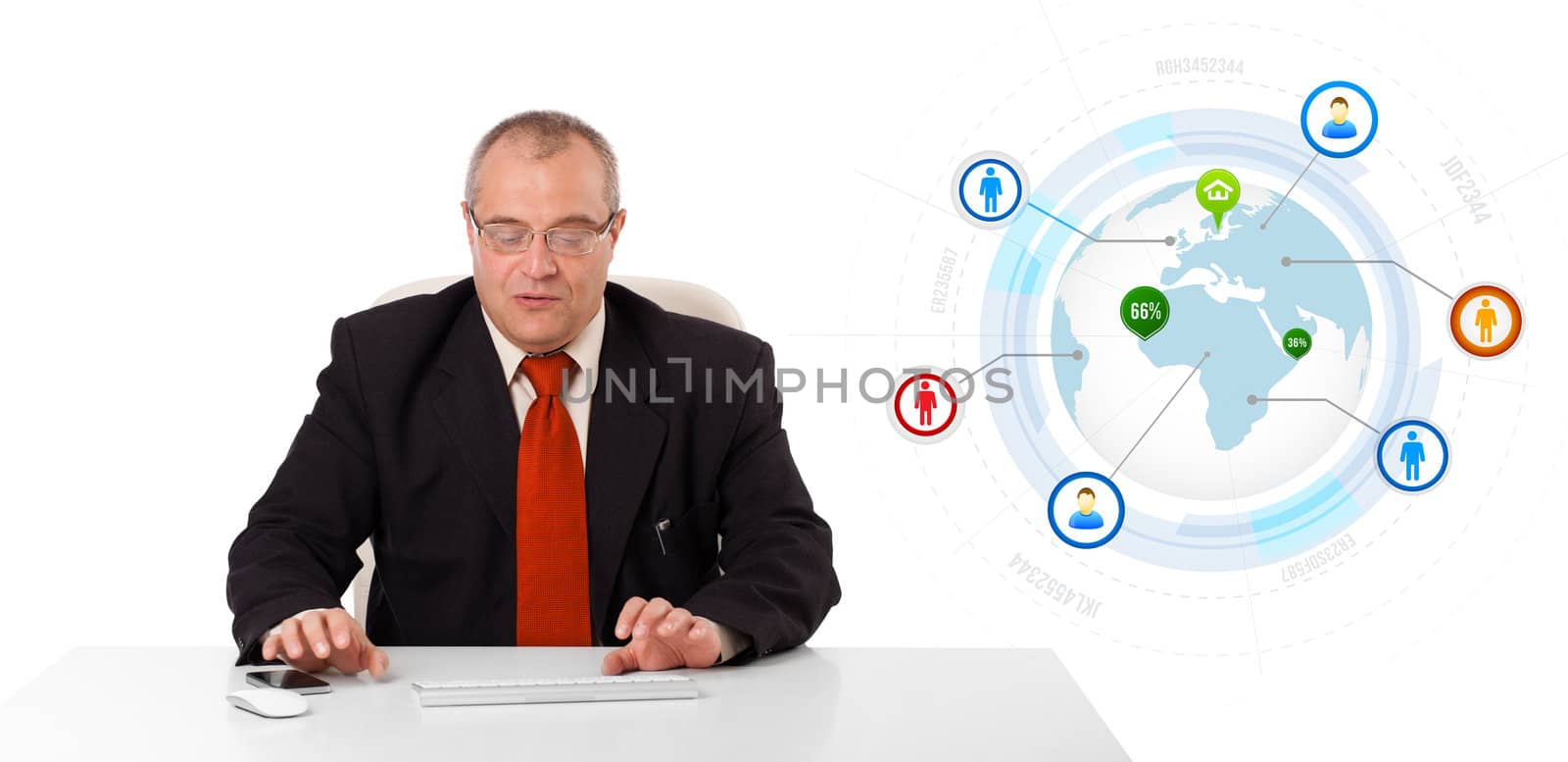 businessman sitting at desk with a globe and social icons, isolated on white