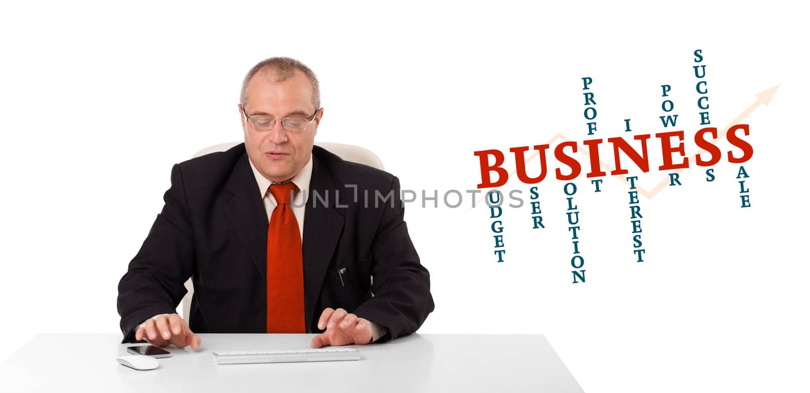 businessman sitting at desk and typing on keyboard with word cloud, isolated on white