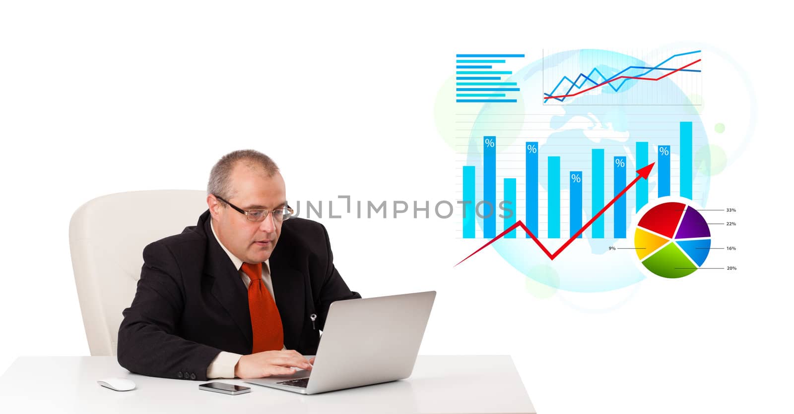 Businessman sitting at desk with laptop and statistics, isolated on white