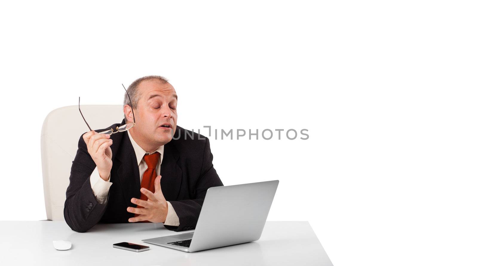buisnessman sitting at desk and looking laptop with copy space, isolated on white