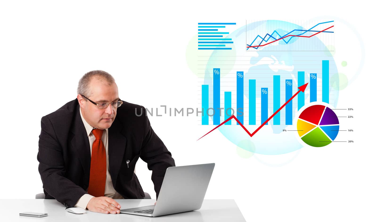 Businessman sitting at desk with laptop and statistics, isolated on white