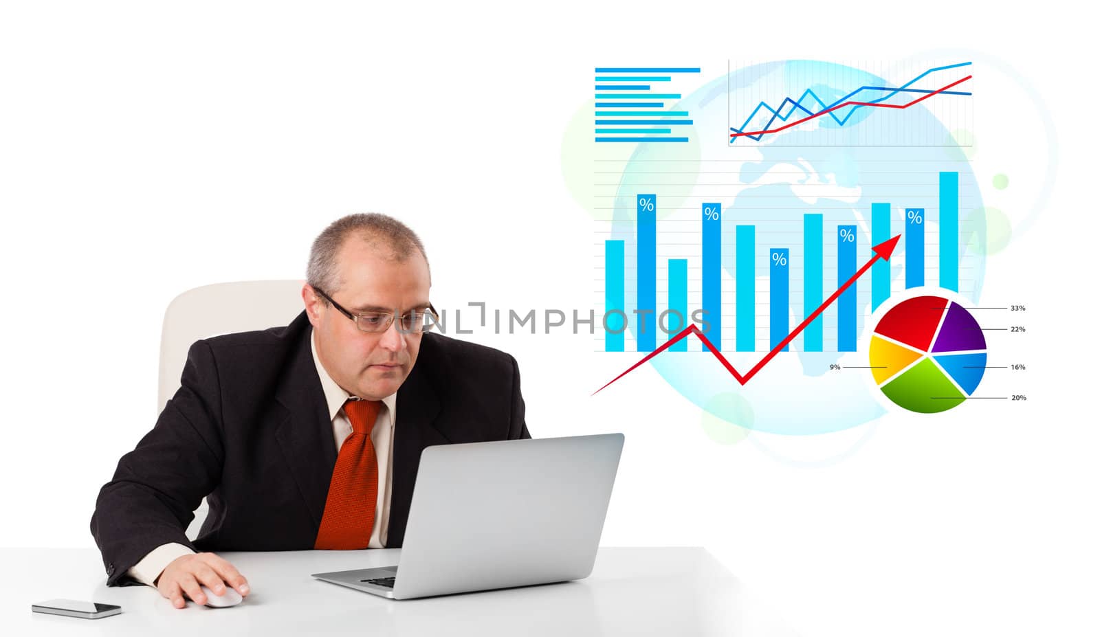 Businessman sitting at desk with laptop and statistics, isolated on white
