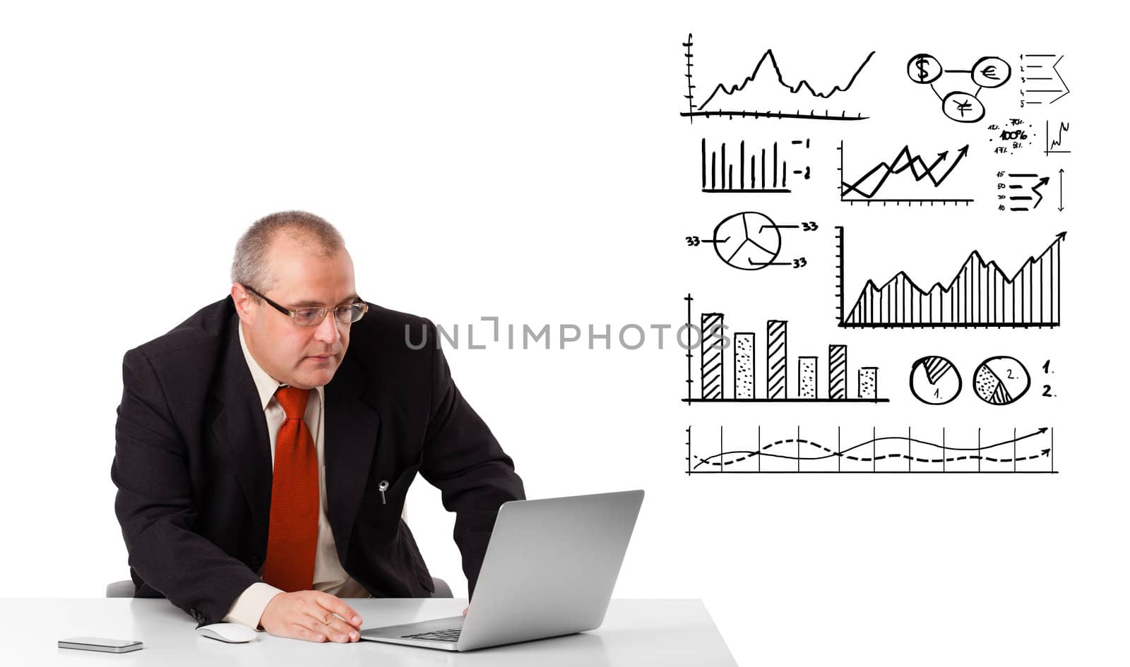 Businessman sitting at desk with diagrams and laptop, isolated on white