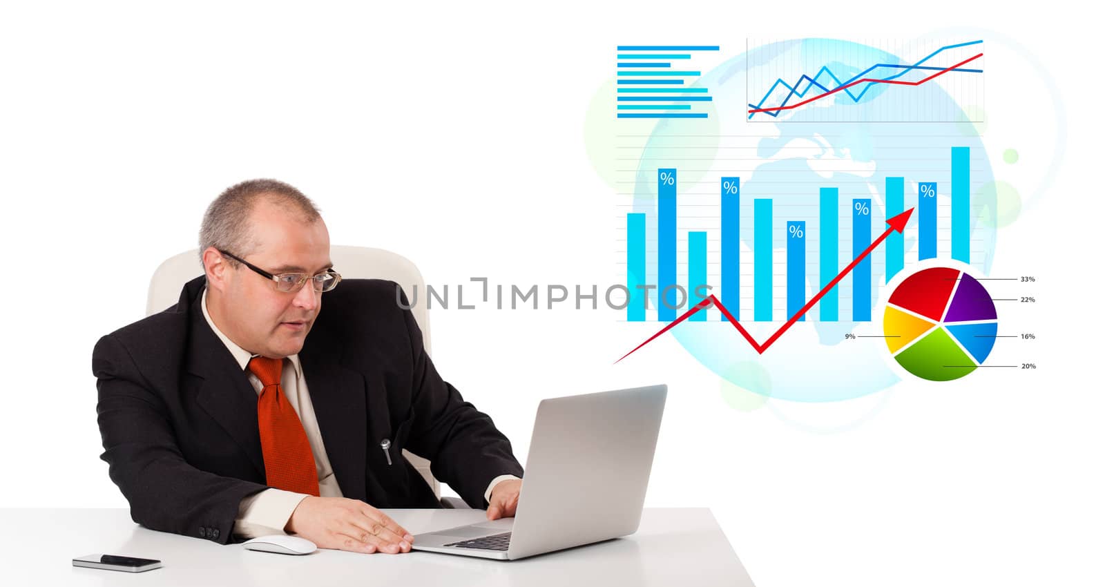 Businessman sitting at desk with laptop and statistics, isolated on white