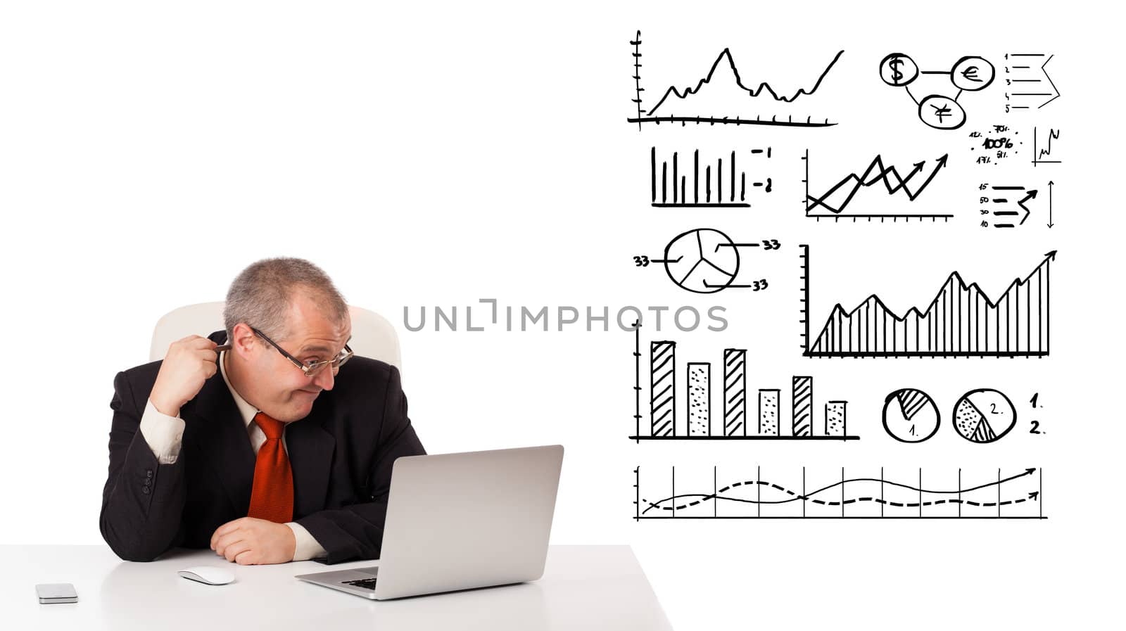 Businessman sitting at desk with diagrams and laptop, isolated on white