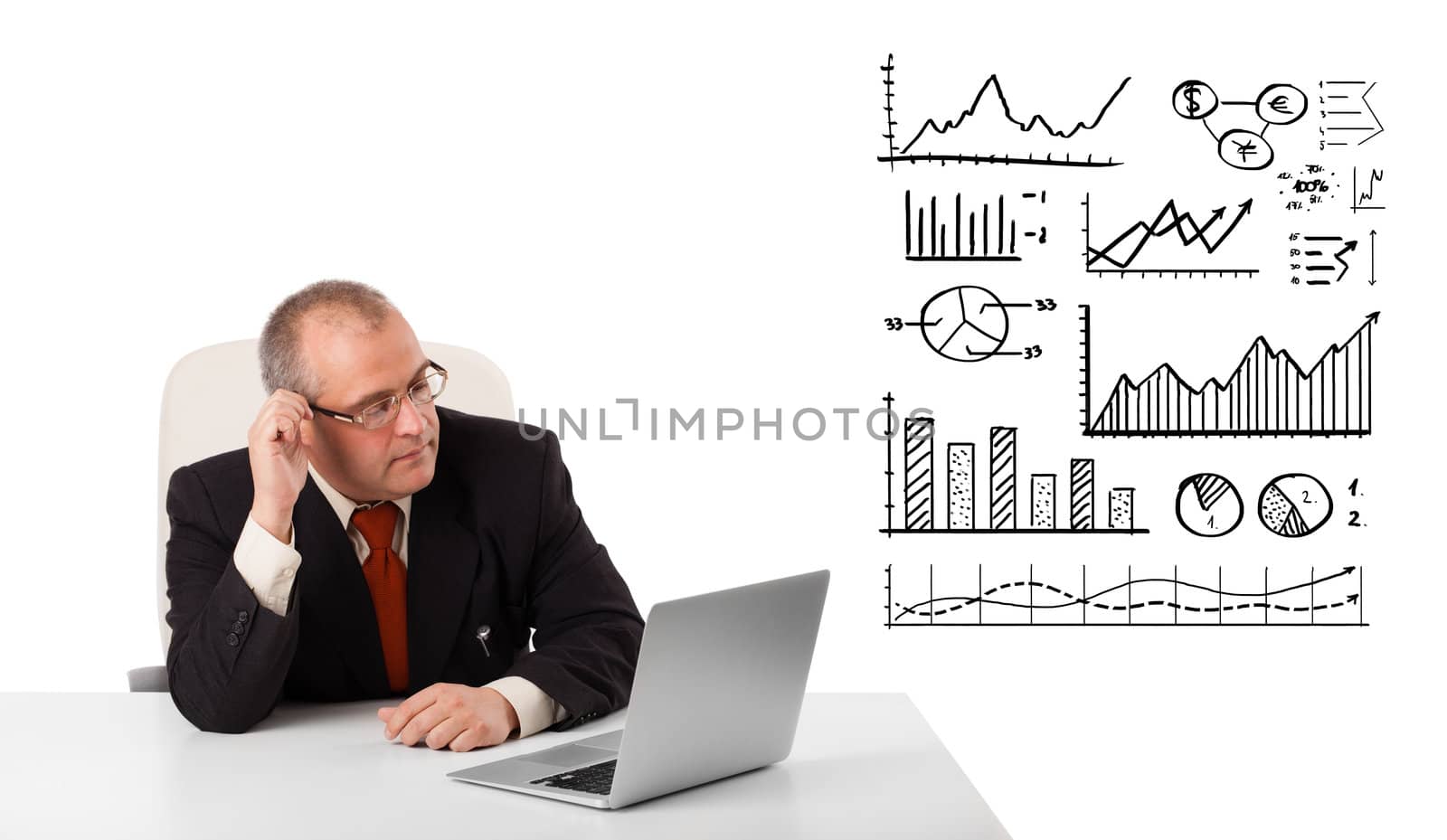 businessman sitting at desk with graphs and laptop, isolated on white