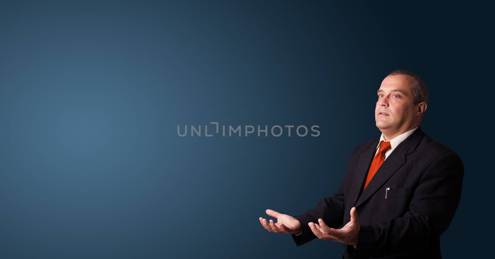 businessman in suit gesturing with copy space