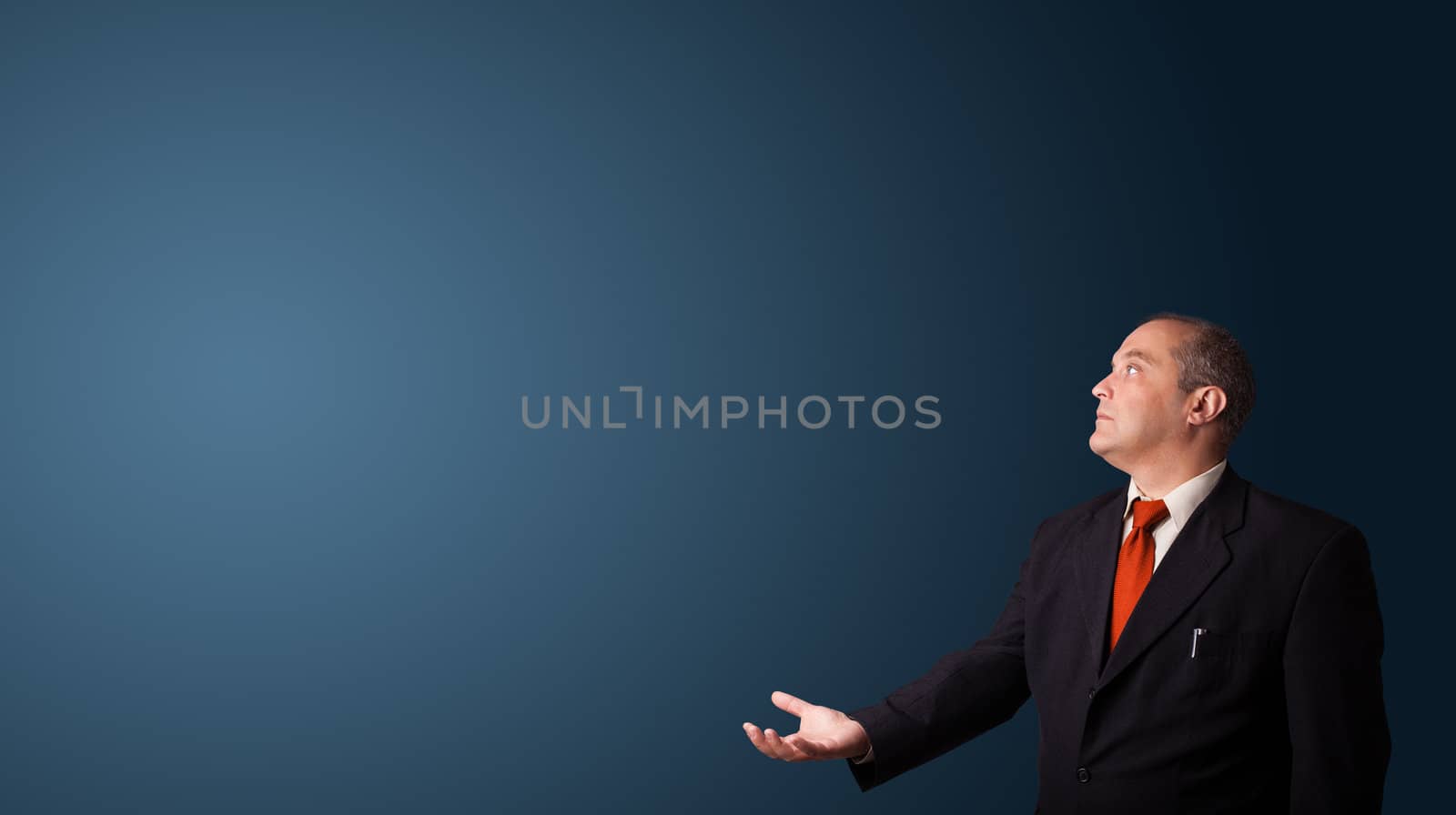 businessman in suit gesturing with copy space