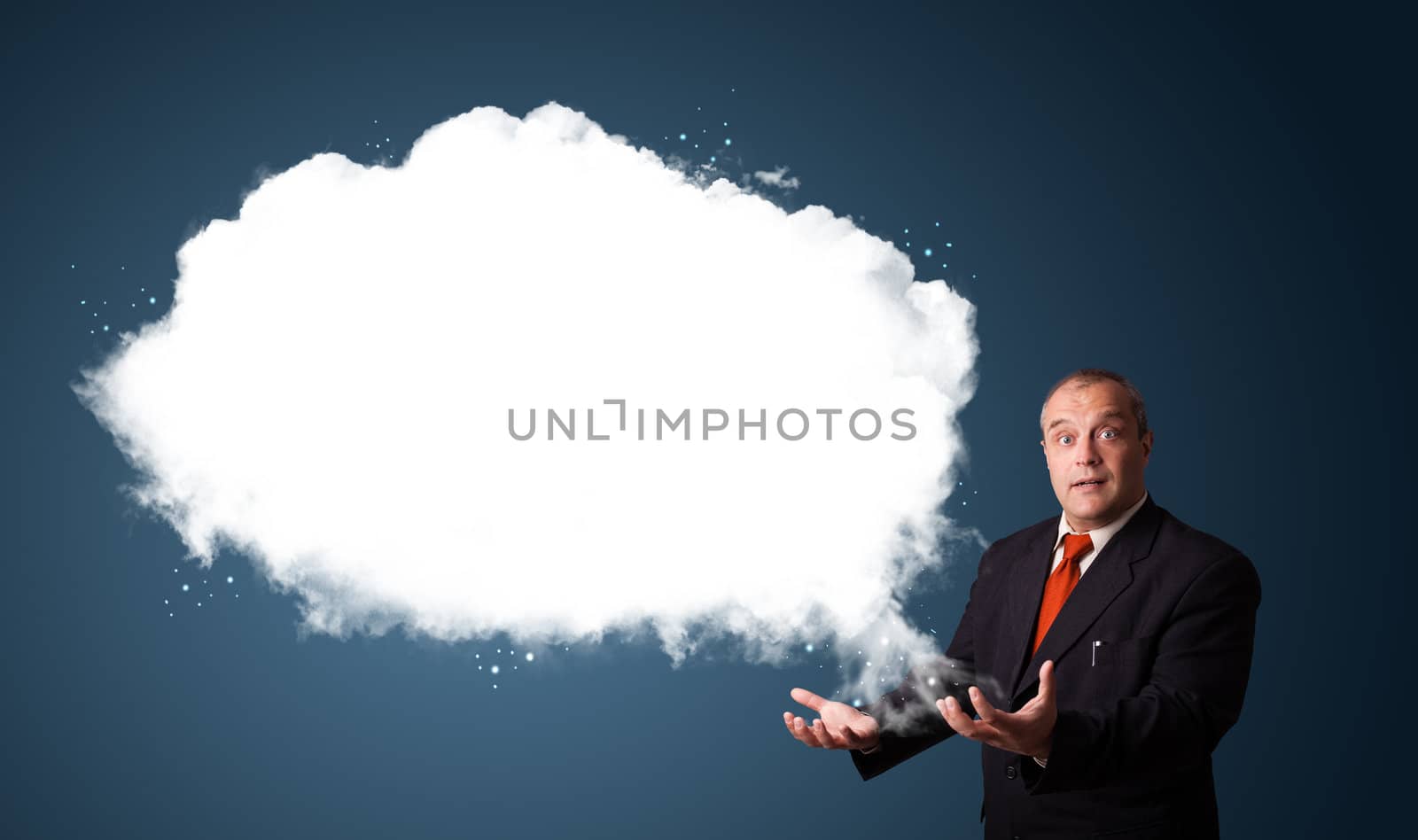 businessman in suit presenting abstract cloud copy space