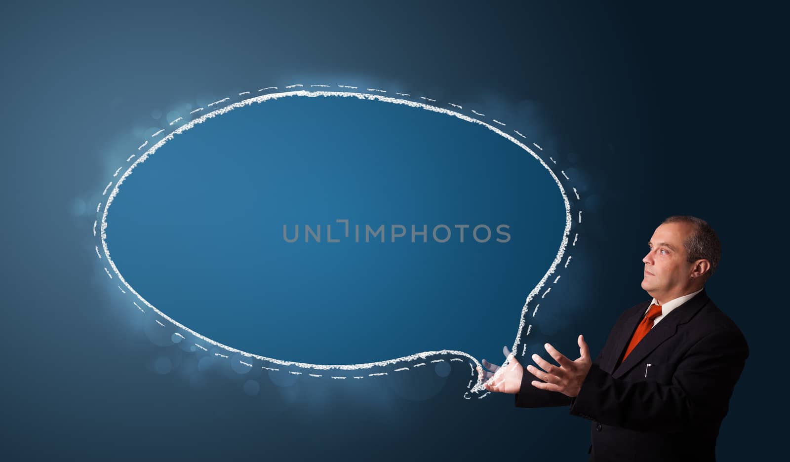 businessman in suit presenting speech bubble copy space