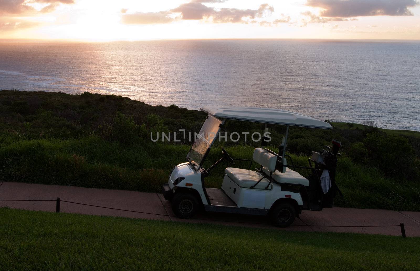 Golf cart at beach or seaside holiday resort course