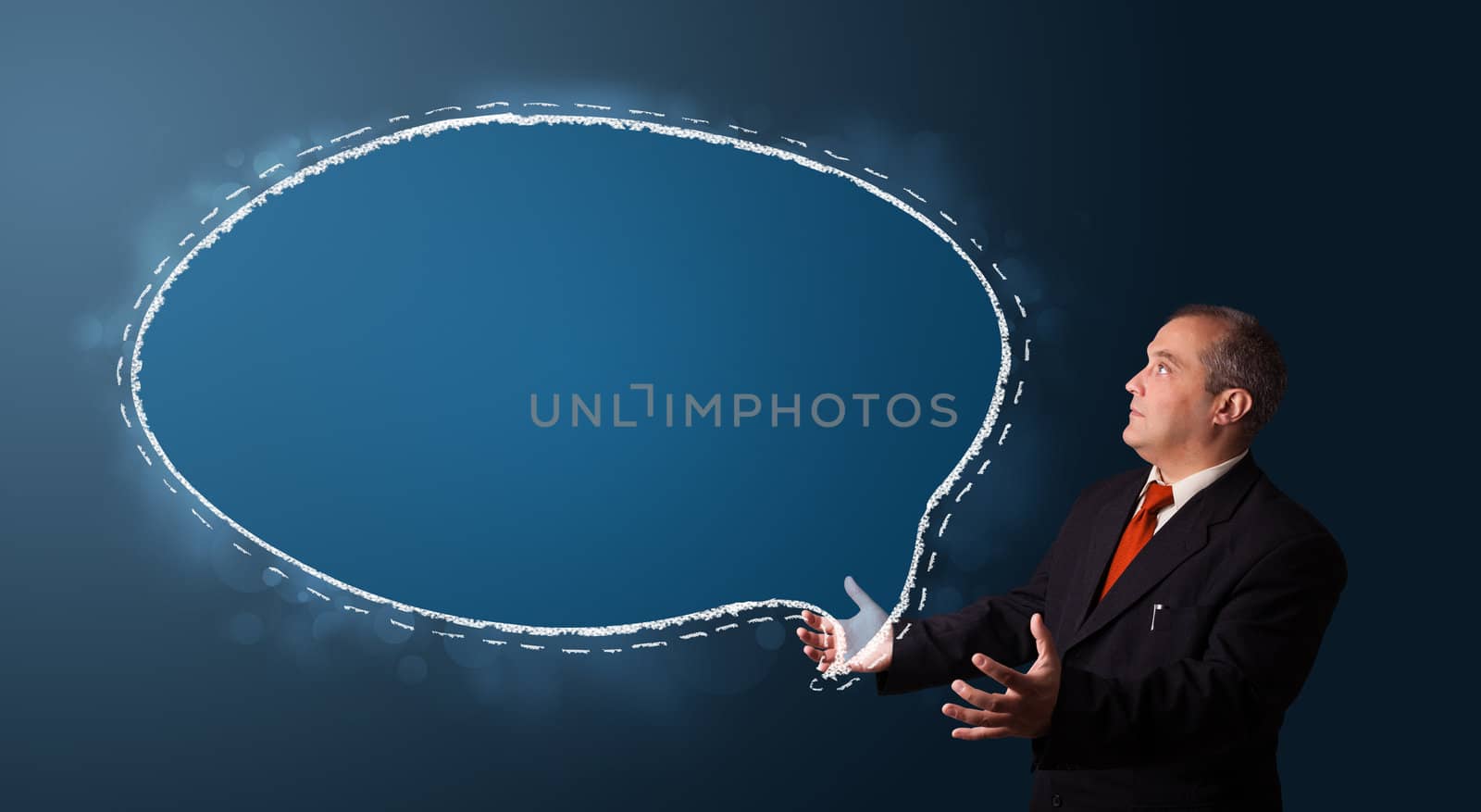 businessman in suit presenting speech bubble copy space