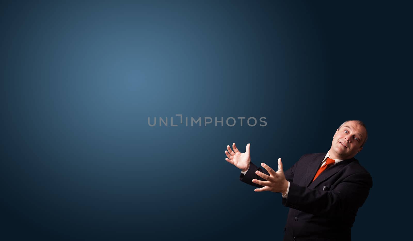 funny businessman in suit gesturing with copy space