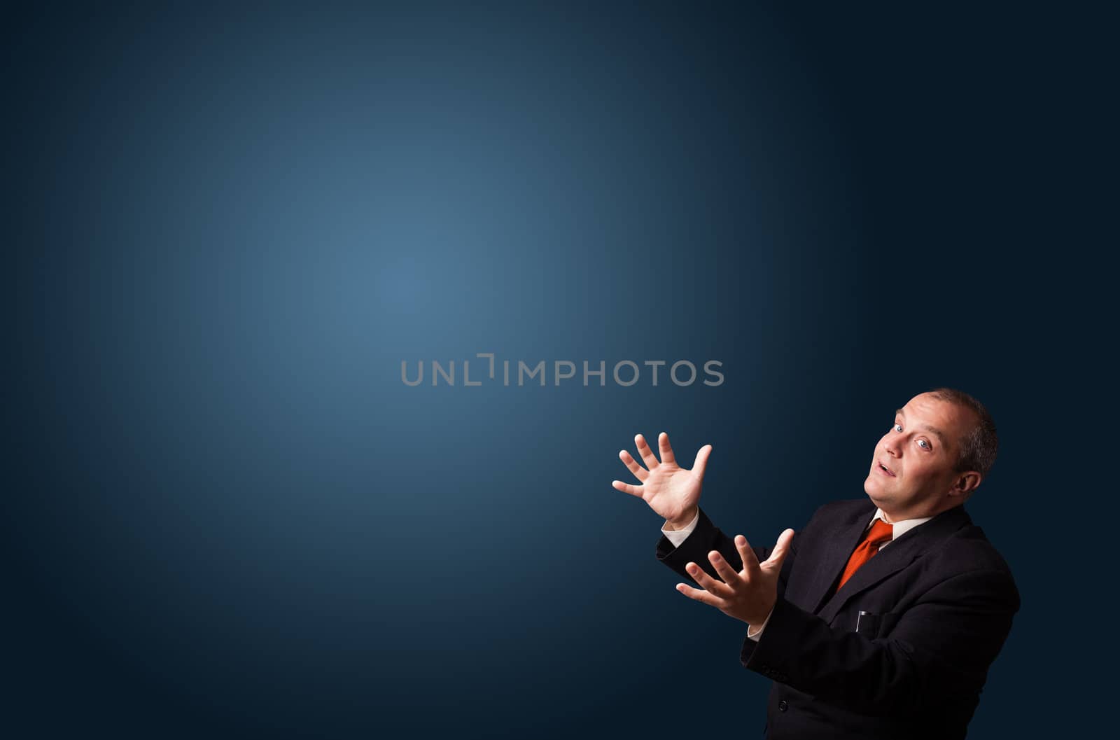 funny businessman in suit gesturing with copy space