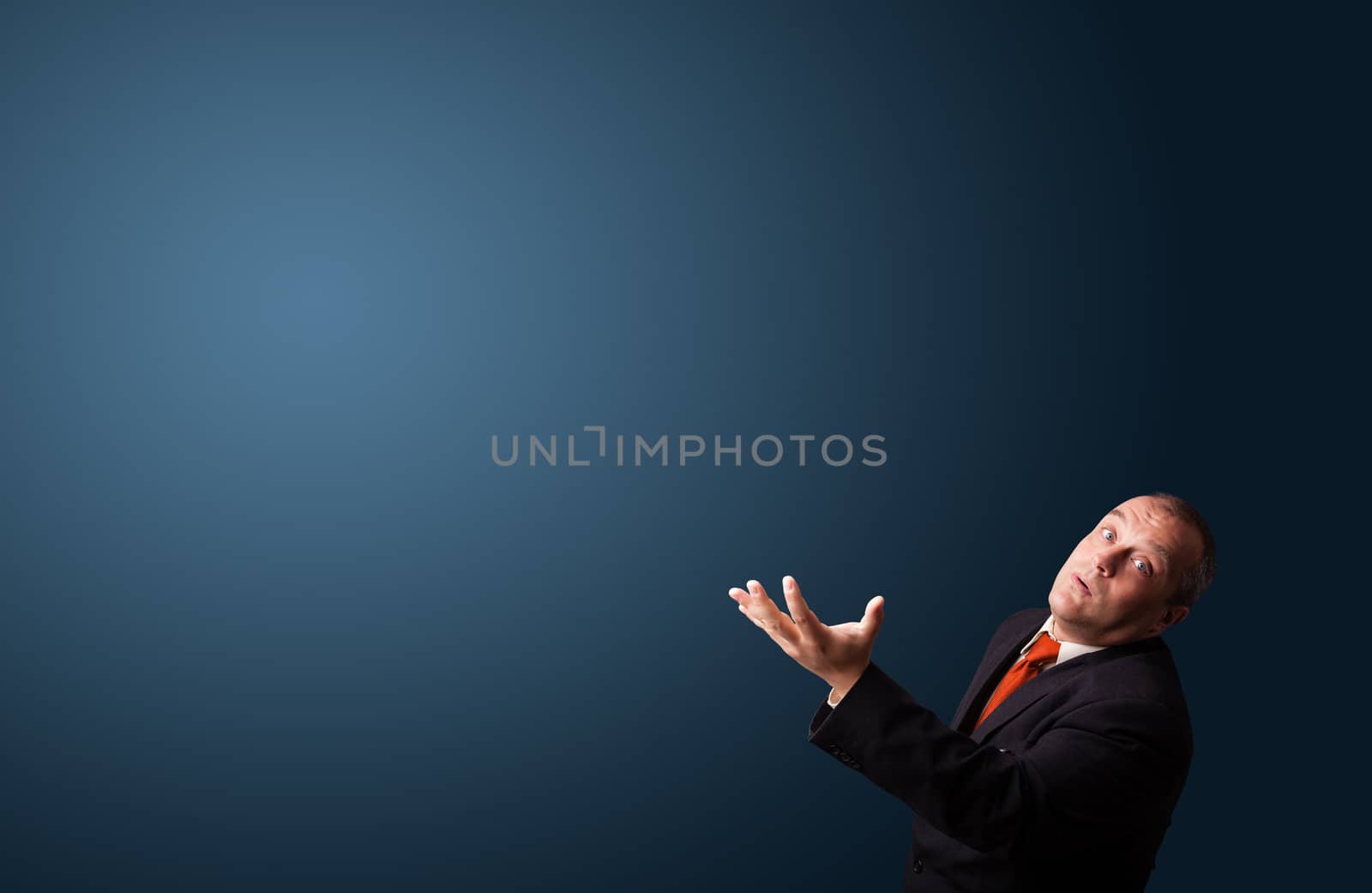 funny businessman in suit gesturing with copy space