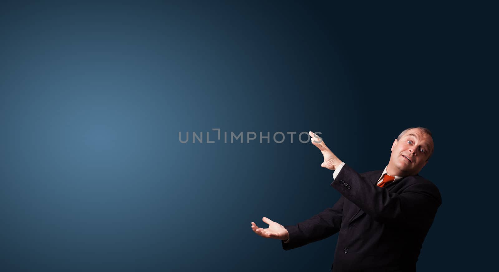 funny businessman in suit gesturing with copy space