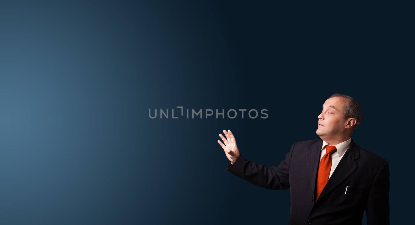 businessman in suit gesturing with copy space