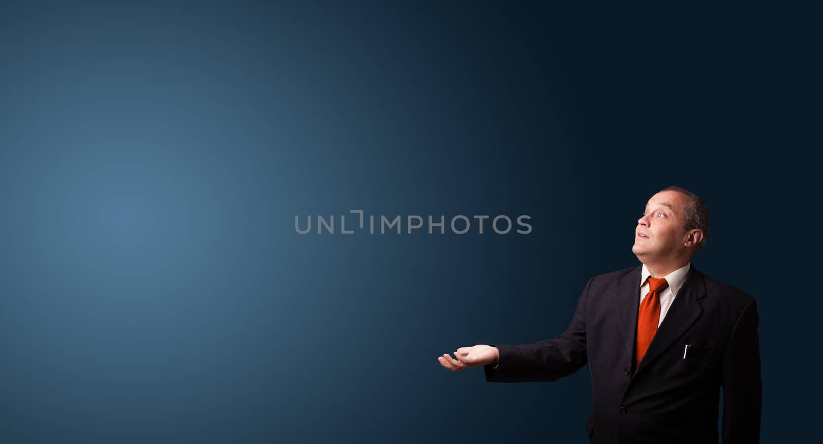 businessman in suit gesturing with copy space