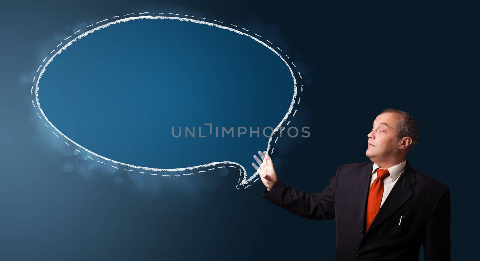 businessman in suit presenting speech bubble copy space