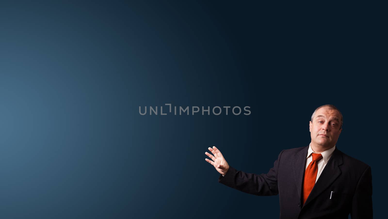 businessman in suit gesturing with copy space