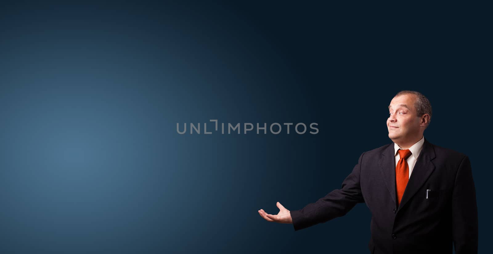 businessman in suit gesturing with copy space