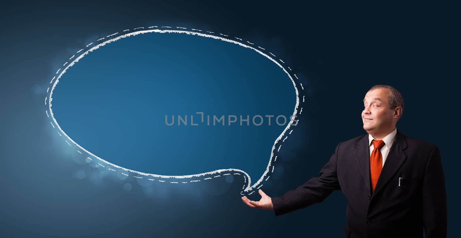 funny businessman in suit presenting speech bubble copy space