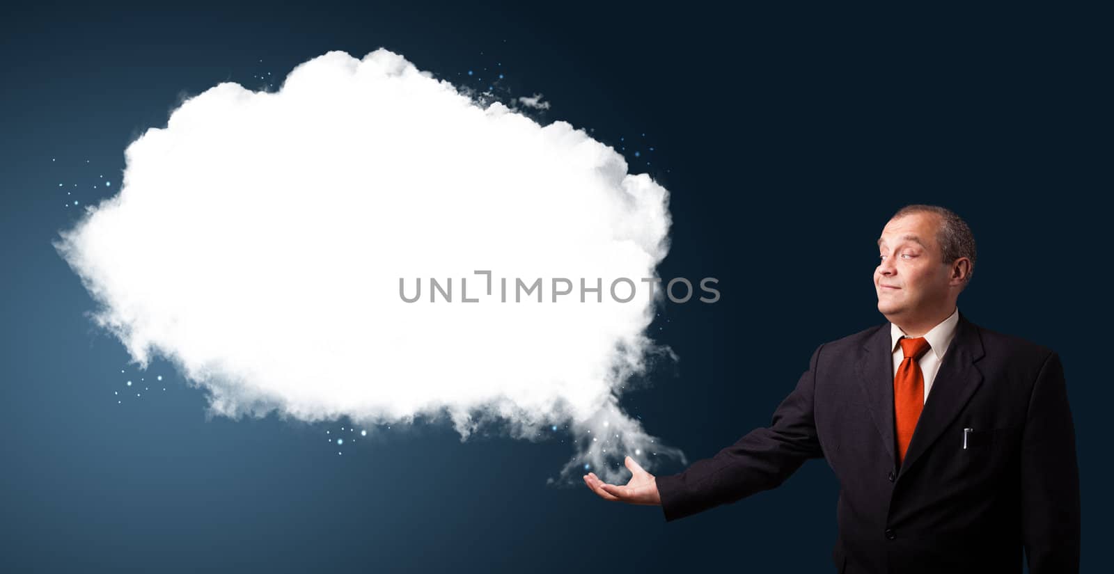 businessman in suit presenting abstract cloud copy space