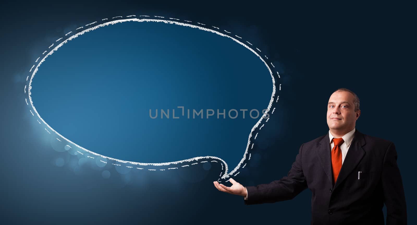 businessman in suit presenting speech bubble copy space