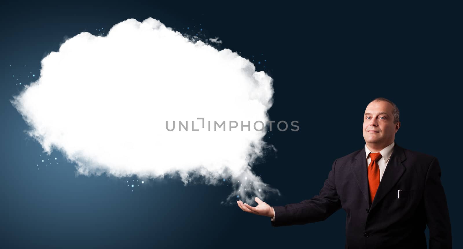 businessman in suit presenting abstract cloud copy space