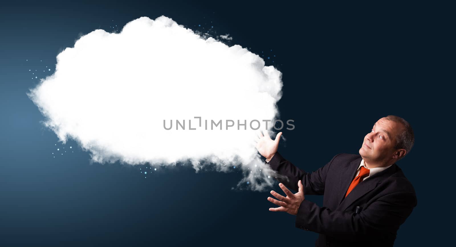 businessman in suit presenting abstract cloud copy space
