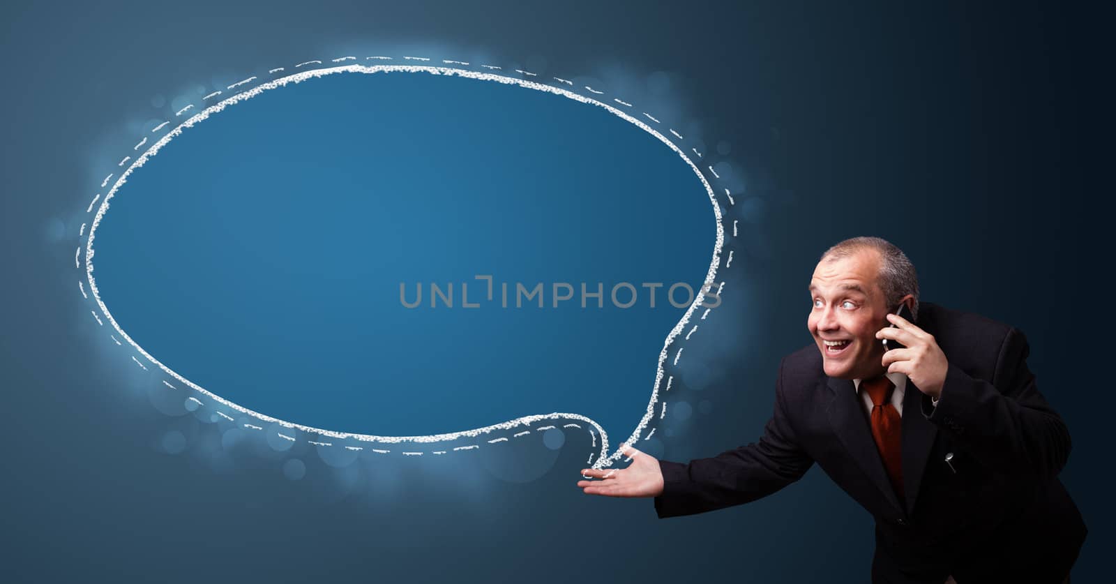 funny businessman in suit holding a phone and presenting speech bubble copy space