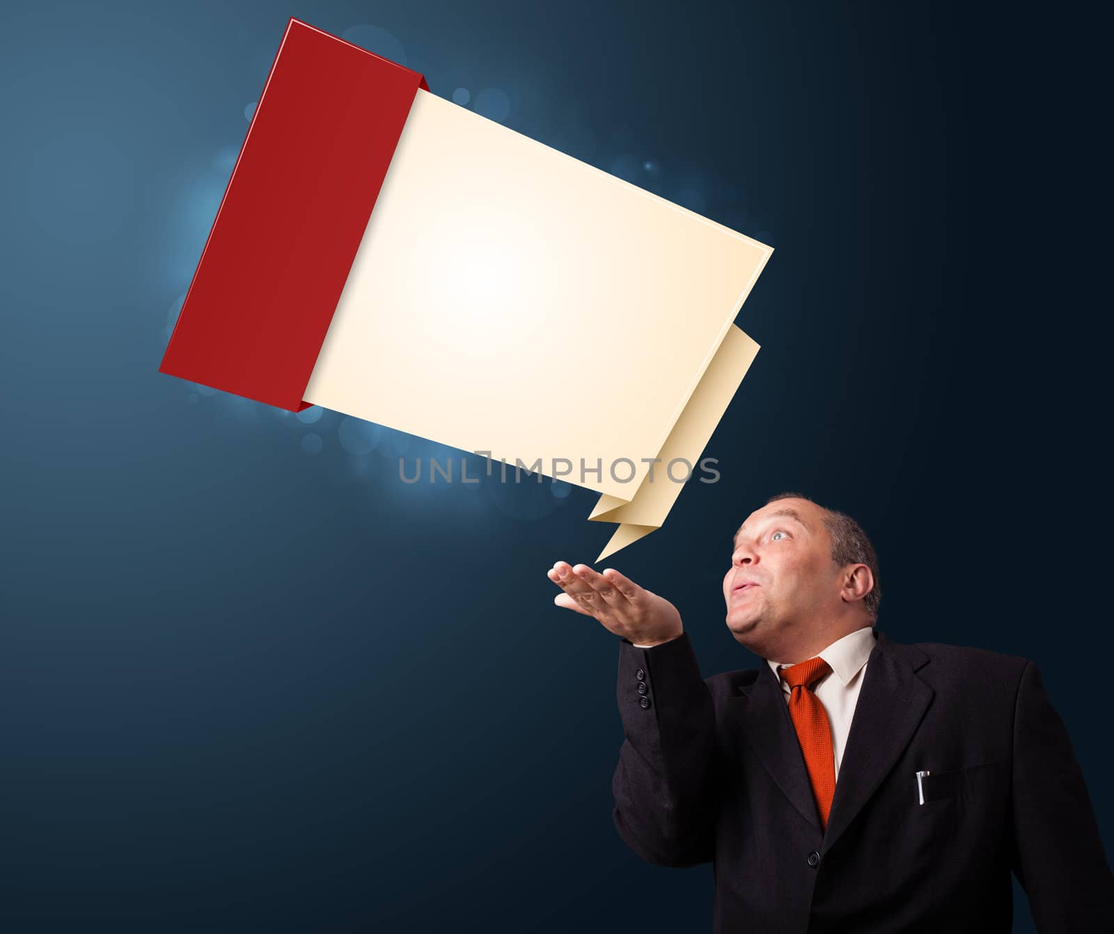 funny businessman in suit presenting modern origami copy space