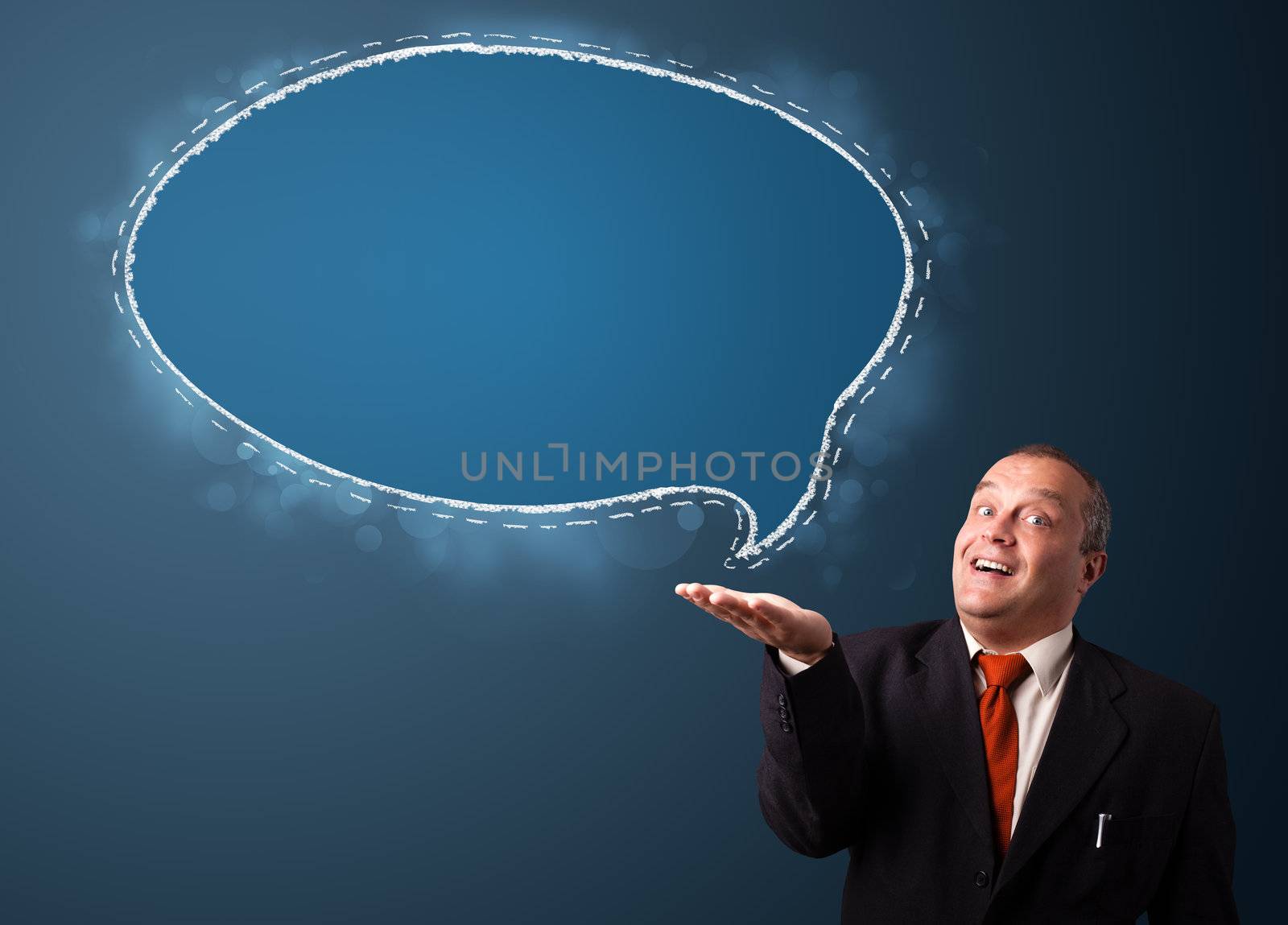 crazy businessman in suit presenting speech bubble copy space